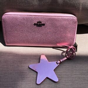 COACH Pink metallic wallet with star accessory
